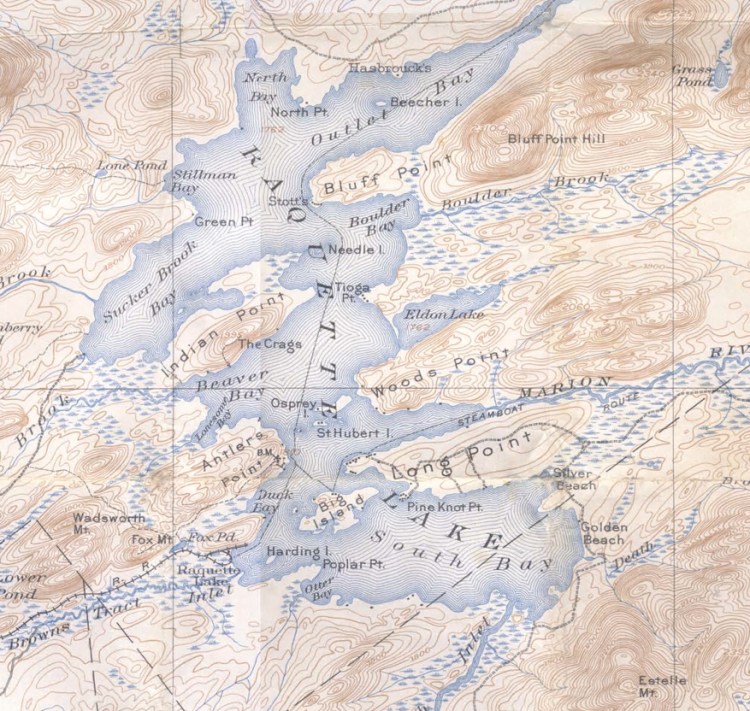 1903 USGS Raquette Lake Quadrangle shows numerous structures on the lakeshore and nothing on the point.